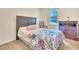 Serene bedroom with a comfortable bed, natural light, and a calm, inviting ambiance at 109 Grange Dr, Wendell, NC 27591