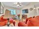 Inviting living room with hardwood floors, cozy seating, and a decorative fireplace at 109 Grange Dr, Wendell, NC 27591