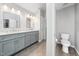Spacious bathroom with double vanity and tile floors at 112 Sterling Ridge Way, Cary, NC 27519