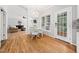 Eat-in kitchen with breakfast table, adjoining living space, and door to the patio at 112 Sterling Ridge Way, Cary, NC 27519