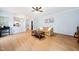 Spacious living room features hardwood floors and is open to the kitchen area at 112 Sterling Ridge Way, Cary, NC 27519