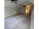 Neutral room showing plush carpeting, dual ceiling fans and ample space, creating a cozy atmosphere at 119 Comanche Dr, Louisburg, NC 27549