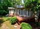 Wooden deck with seating, perfect for outdoor entertaining at 119 Long Shadow Ln, Cary, NC 27518