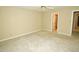 Large bedroom with neutral carpet, base trim and paint awaits personalization at 119 Long Shadow Ln, Cary, NC 27518