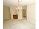 Formal dining room features chandelier and wet bar at 119 Long Shadow Ln, Cary, NC 27518