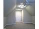 Spacious bonus room with carpet and fan lighting at 12 Crail Ct, Durham, NC 27712