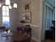 Dining room featuring hardwood table, chairs, and decor at 12 Crail Ct, Durham, NC 27712