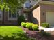 Well maintained brick home with mature landscaping and a manicured lawn at 12 Crail Ct, Durham, NC 27712