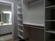 Walk in closet with built-in shelving and storage at 12 Crail Ct, Durham, NC 27712