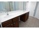 Bathroom with double sink vanity, tile flooring and shower with glass door at 120 Jennel Way, Durham, NC 27707