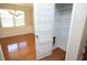 Pantry with built-in shelving system and storage, next to a dining room at 120 Jennel Way, Durham, NC 27707