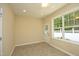 Sunroom with door to backyard at 120 Jennel Way, Durham, NC 27707