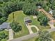 Aerial view of home including a basketball court, shed, soccer goal, and circular driveway at 123 Scheer Ave, Durham, NC 27703