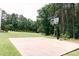 Featuring a basketball court and soccer goal, this large back yard has lots of space at 123 Scheer Ave, Durham, NC 27703