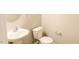 Half bath features modern sink and toilet at 123 Scheer Ave, Durham, NC 27703