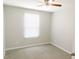 Neutral bedroom with a ceiling fan and a bright window at 123 Scheer Ave, Durham, NC 27703
