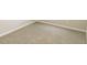 Neutral carpet in bedroom with base trim and beige walls at 123 Scheer Ave, Durham, NC 27703
