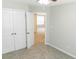 Bedroom with double-door closet, walk-in closet and neutral carpet at 123 Scheer Ave, Durham, NC 27703