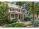 Charming two-story home with a covered front porch, landscaped yard, and a two-car garage at 124 Cypress View Way, Apex, NC 27502