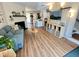 Comfortable living room with a cozy fireplace, modern decor, and an open floor plan at 129 Friar Ln, Carrboro, NC 27510