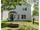 Inviting backyard space featuring a fire pit and beautiful landscaping at 1310 Southgate Dr, Raleigh, NC 27610