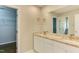 Bathroom features a double vanity with granite countertops at 1310 Southgate Dr, Raleigh, NC 27610