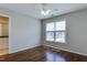 Bedroom with wood floors, a window that lets in natural light, and fresh paint at 1310 Southgate Dr, Raleigh, NC 27610