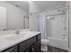 Bathroom featuring a shower-tub combination, a vanity, and a towel rack at 137 Campaign Dr, Mebane, NC 27302