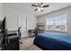 Bedroom setup as a workspace with a carpeted floor and natural light from the window at 137 Campaign Dr, Mebane, NC 27302