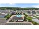 Community pool area with ample parking, a playground, and an adjacent clubhouse at 137 Campaign Dr, Mebane, NC 27302