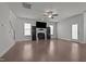 Cozy living room includes a fireplace, TV, and access to the backyard at 137 Campaign Dr, Mebane, NC 27302