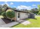 View of home with yard and detached shed at 1512 Bacon St, Durham, NC 27701