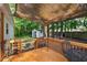 Outdoor deck featuring shade cover and backyard access, perfect for relaxing and entertaining at 154 Jared Dr, Fuquay Varina, NC 27526