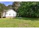 Spacious backyard offering a private retreat with mature trees and room for outdoor gatherings at 154 Jared Dr, Fuquay Varina, NC 27526