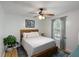 Cozy bedroom with hardwood floors, neutral decor, and a window providing natural light at 154 Jared Dr, Fuquay Varina, NC 27526