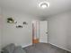 Neutral bedroom offers carpet, shelving and light gray walls at 154 Jared Dr, Fuquay Varina, NC 27526