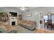 Living room with a fireplace, sofas, and built-in shelving at 154 Jared Dr, Fuquay Varina, NC 27526