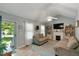 This living room boasts bright light, a fireplace, and built in shelving at 154 Jared Dr, Fuquay Varina, NC 27526