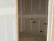 An unfinished laundry room includes utility hookups and bare flooring ready for appliances at 1613 Malcus Ct # 68, Fuquay Varina, NC 27526