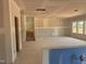 Unfinished living room featuring stairs to the second floor and large windows at 1613 Malcus Ct # 68, Fuquay Varina, NC 27526