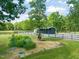 Picturesque grounds with garden and barn, perfect for outdoor enjoyment and equestrian pursuits at 1717 Ormond Rd, Hurdle Mills, NC 27541