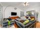 Bright living room featuring wood floors, modern furniture, and neutral paint at 2007 Eastwood Dr, Durham, NC 27703