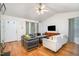 Bright living room featuring wood floors, modern furniture, and neutral paint at 2007 Eastwood Dr, Durham, NC 27703