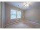 Bedroom with carpet, a window with blinds, and a ceiling fan at 203 Halls Mill Dr, Cary, NC 27519