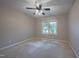 Bedroom featuring a ceiling fan and a window with blinds at 203 Halls Mill Dr, Cary, NC 27519