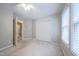 Bedroom with carpet, closet, a window with blinds, and a ceiling fan at 203 Halls Mill Dr, Cary, NC 27519