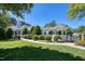 Community clubhouse featuring a gazebo and accessible ramp, surrounded by well-manicured lawn at 203 Halls Mill Dr, Cary, NC 27519
