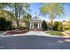 Charming clubhouse featuring a well manicured landscape, covered entrance, and classic architectural details at 203 Halls Mill Dr, Cary, NC 27519