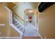 Bright foyer with staircase and view into the living room with a fireplace at 203 Halls Mill Dr, Cary, NC 27519