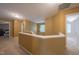 Hallway view with neutral paint, neutral carpet, and access to multiple rooms at 203 Halls Mill Dr, Cary, NC 27519